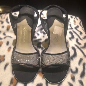 Caparros black material shoes with leather soles